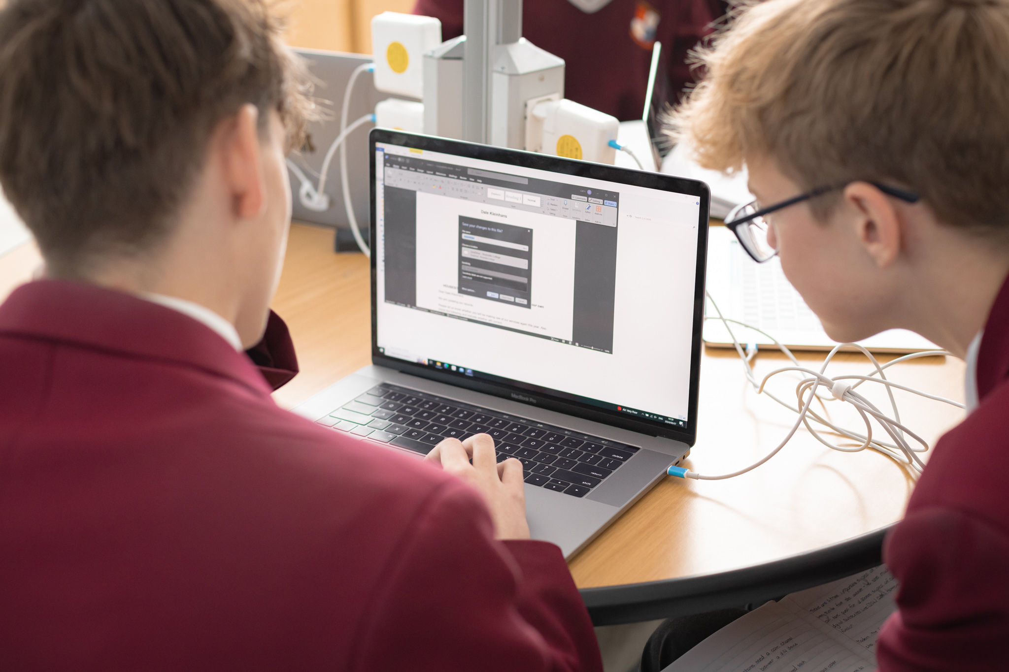 Riverside College High school learners working on Macbooks in the Apple Mac centre