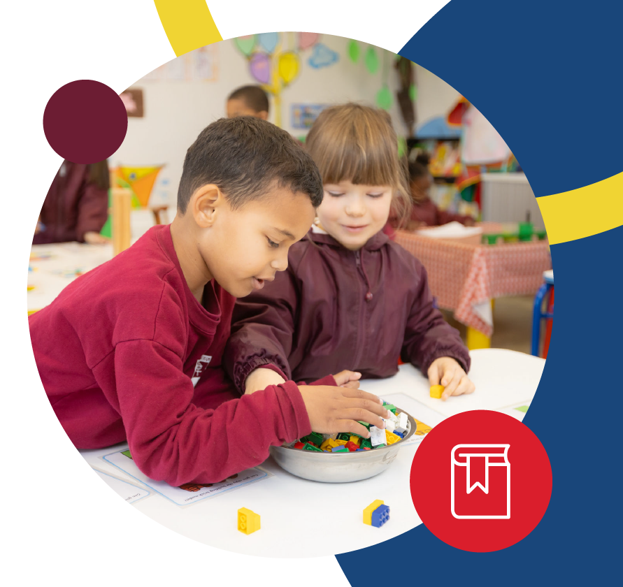 Two Riverside College pre-preprimary school learners sitting at a table while having fun and learning with lego blocks