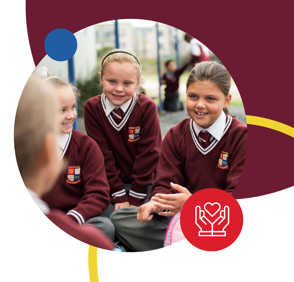 Four Riverside College Primary school learners talking and having fun at break