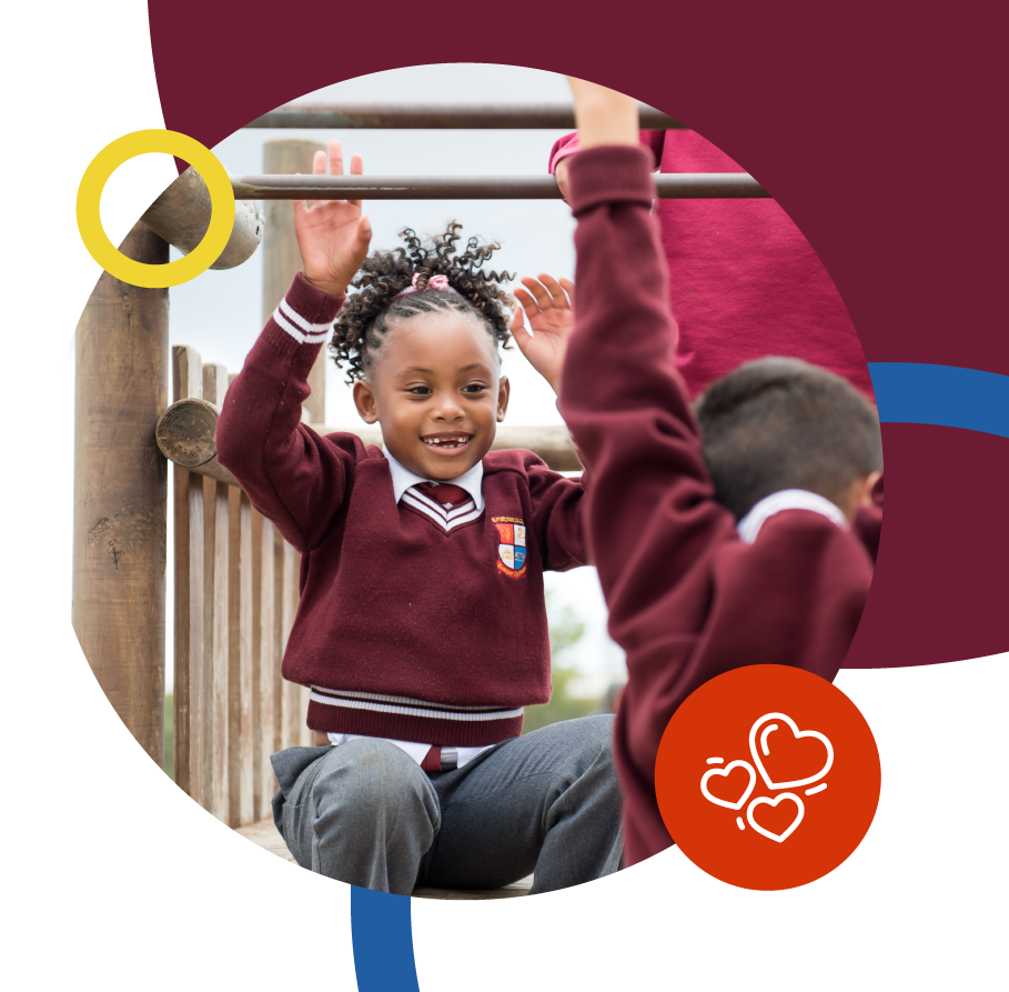 Two Riverside College Primary school learners having fun and playing on a jungle gym